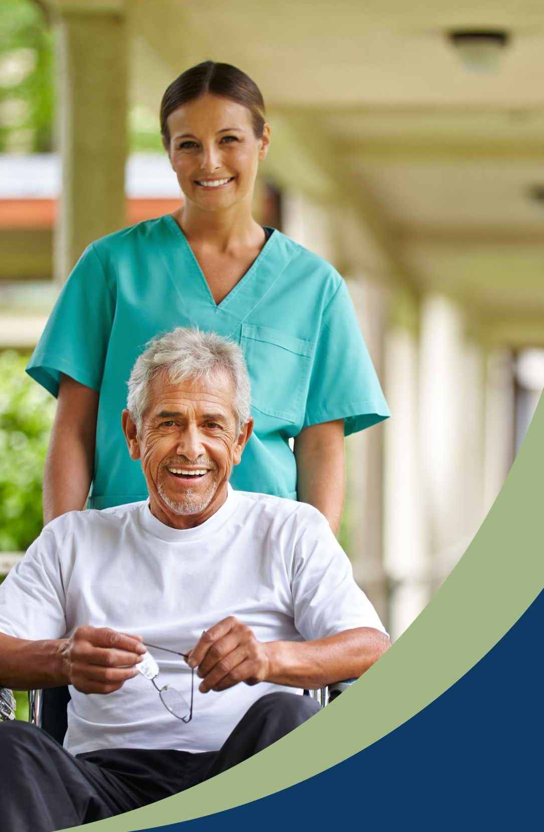 Home health clinician standing with a smiling older adult who uses a wheelchair